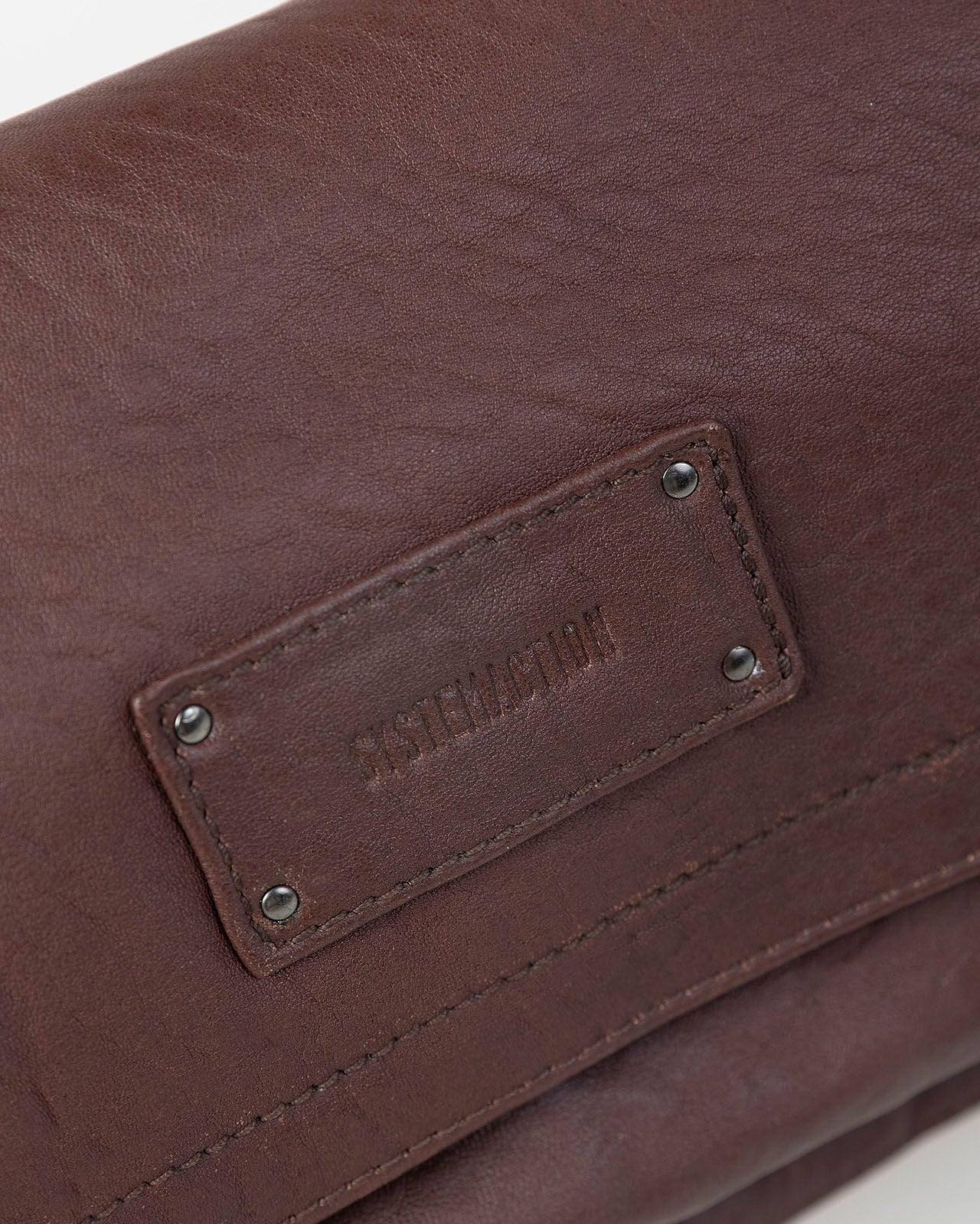 Bolso piel tachas