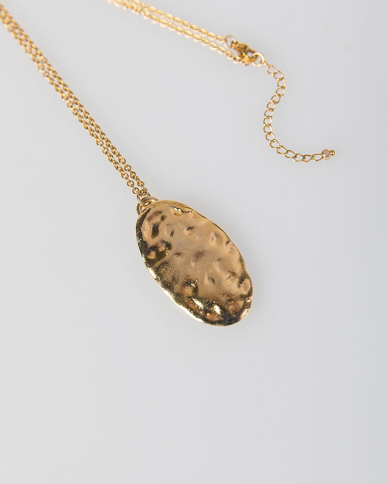 Collar largo pieza dorada