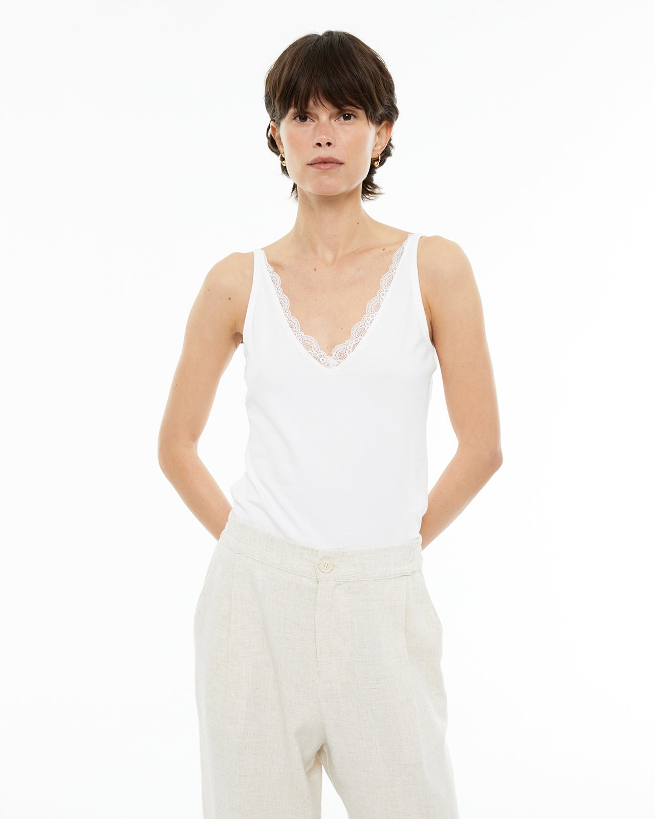 Basic fitted strappy top with lace neckline