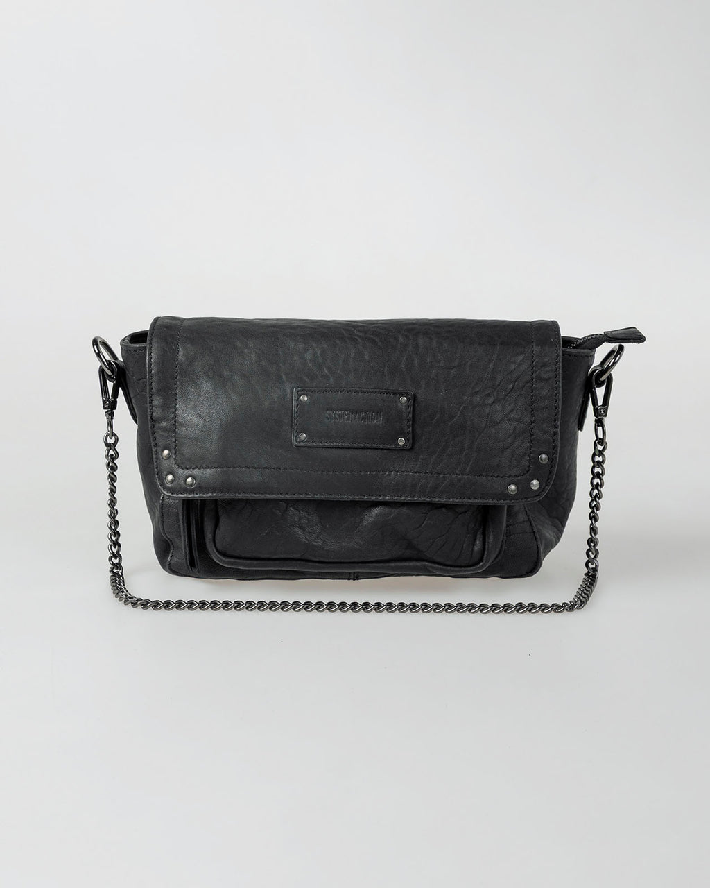 Bolso piel tachas