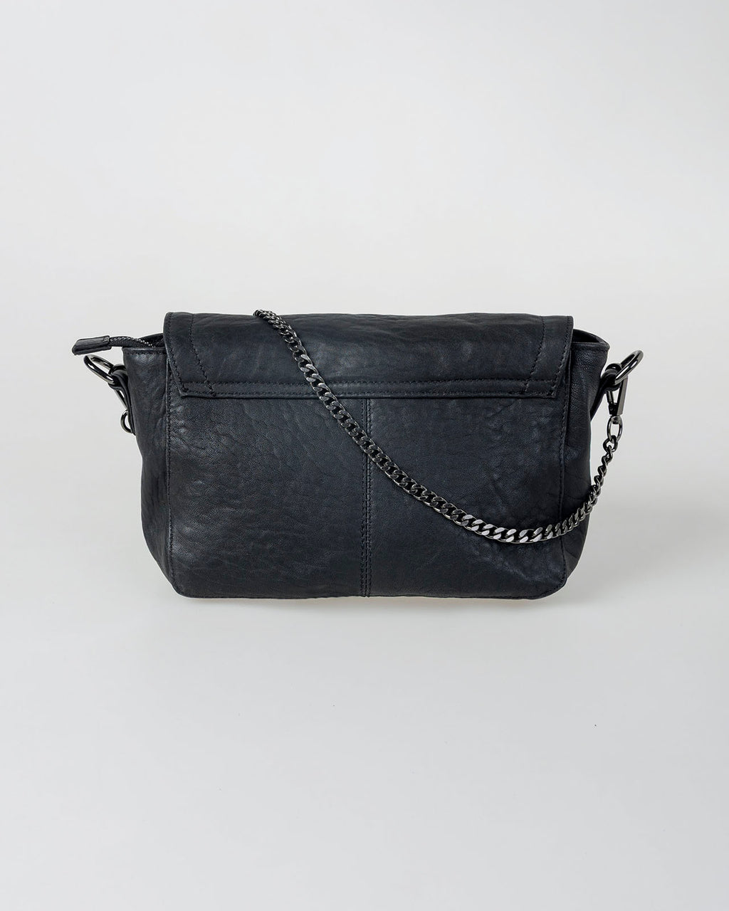 Bolso piel tachas