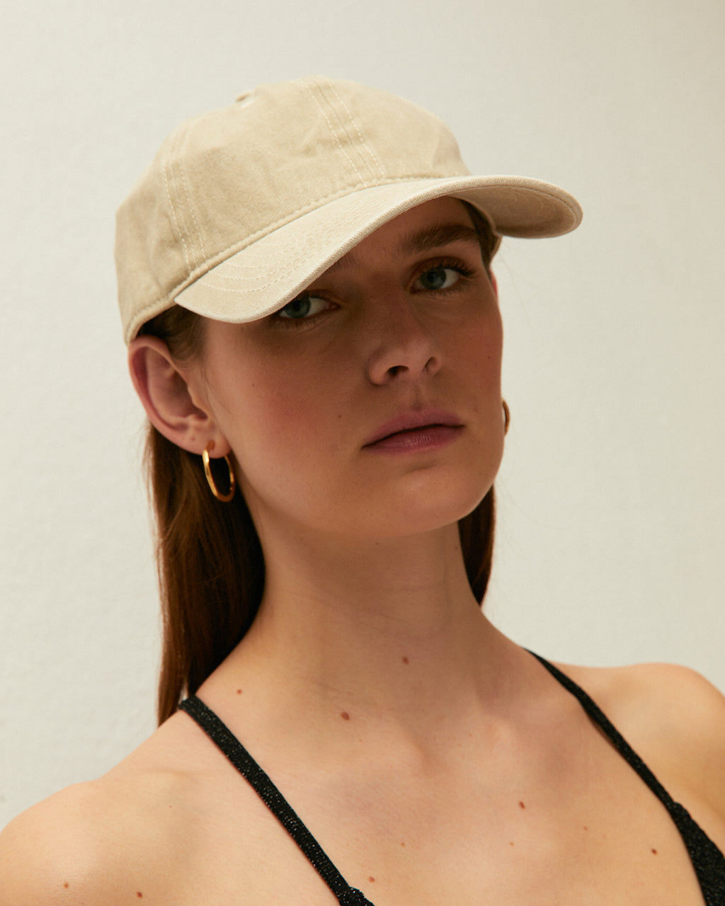 Distressed dye effect cap